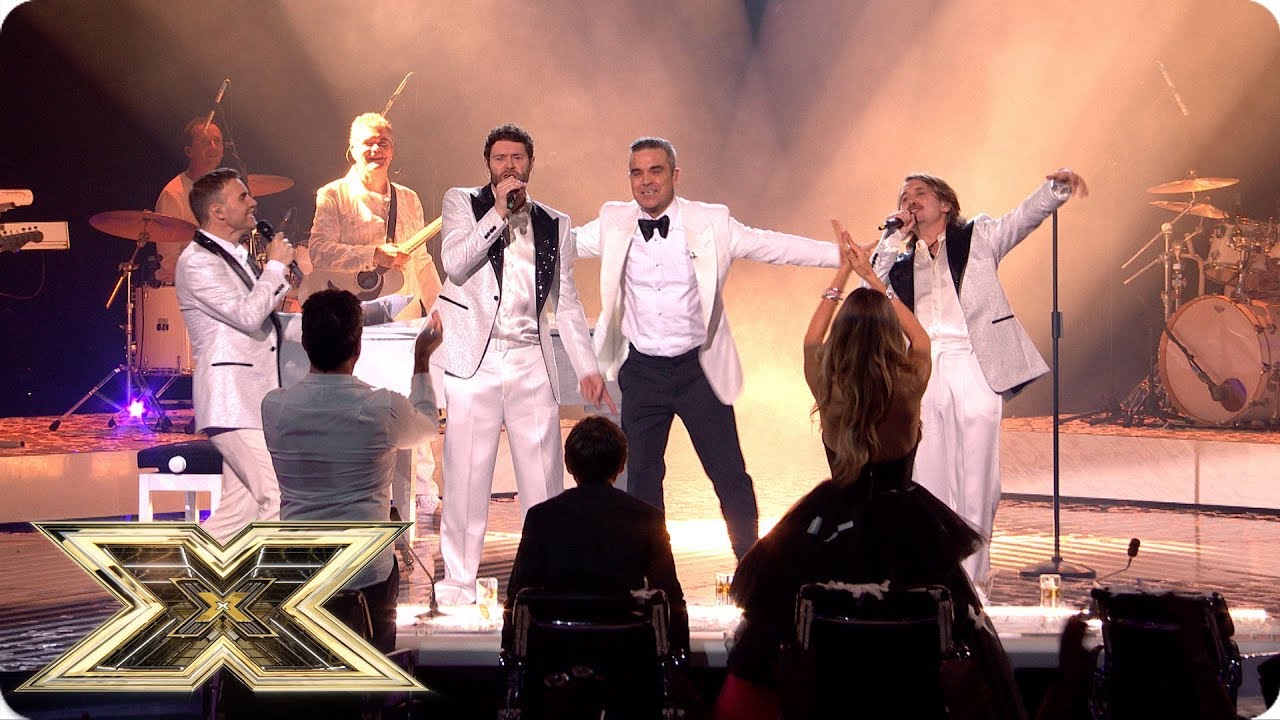 Robbie Williams voor even terug in Take That SixoclockTV